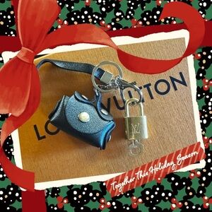 Louis Vuitton vintage lock and key set makes a beautiful gift comes with charm